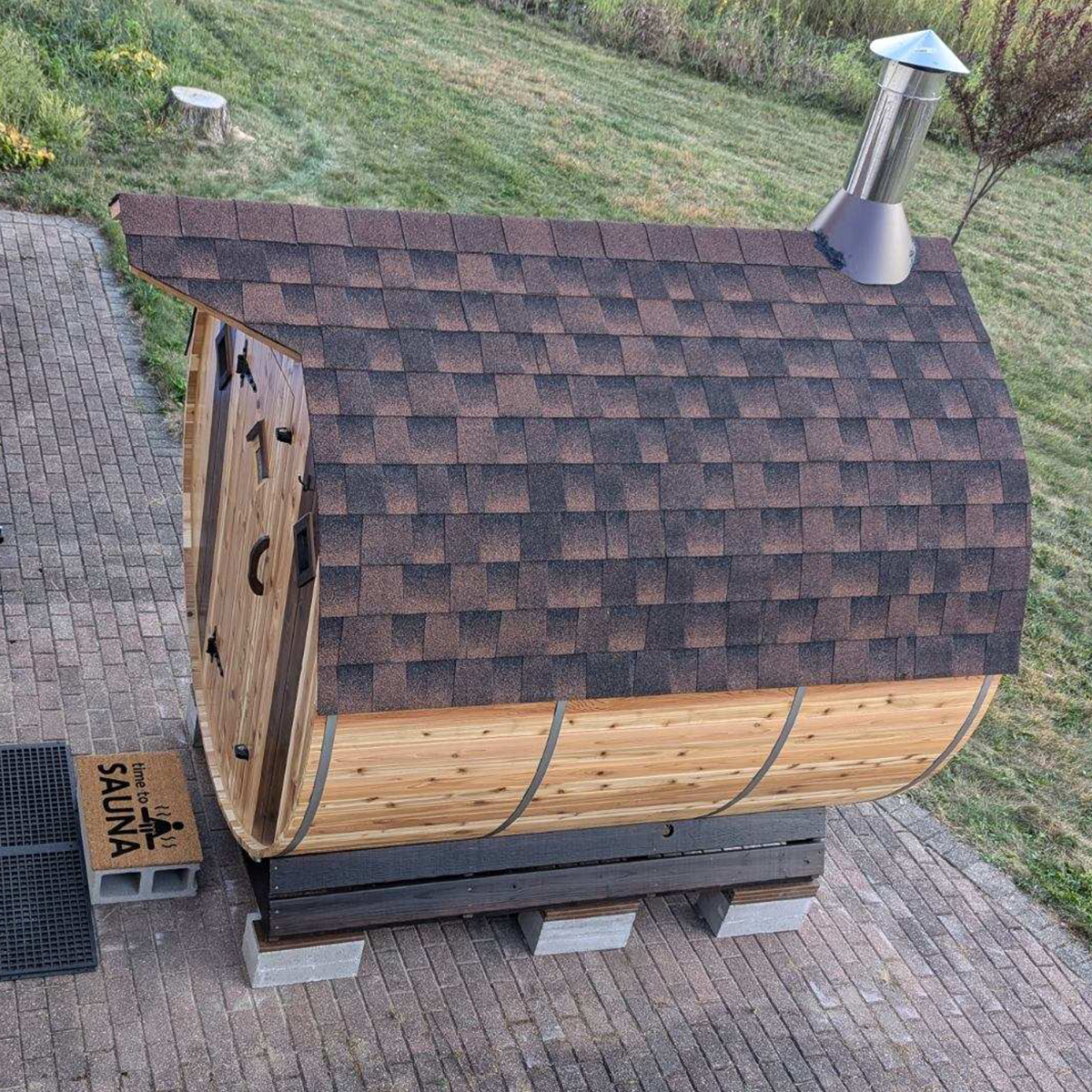 Premium shingles on barrel sauna roof