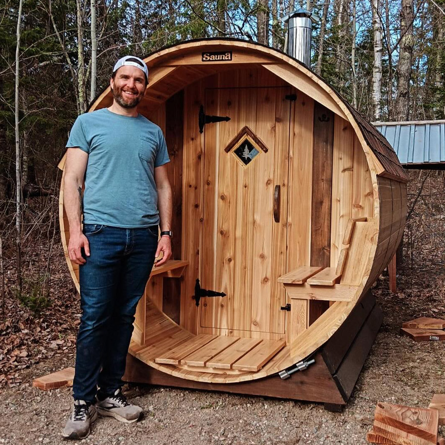 Customer enjoying Cedar Sense barrel sauna