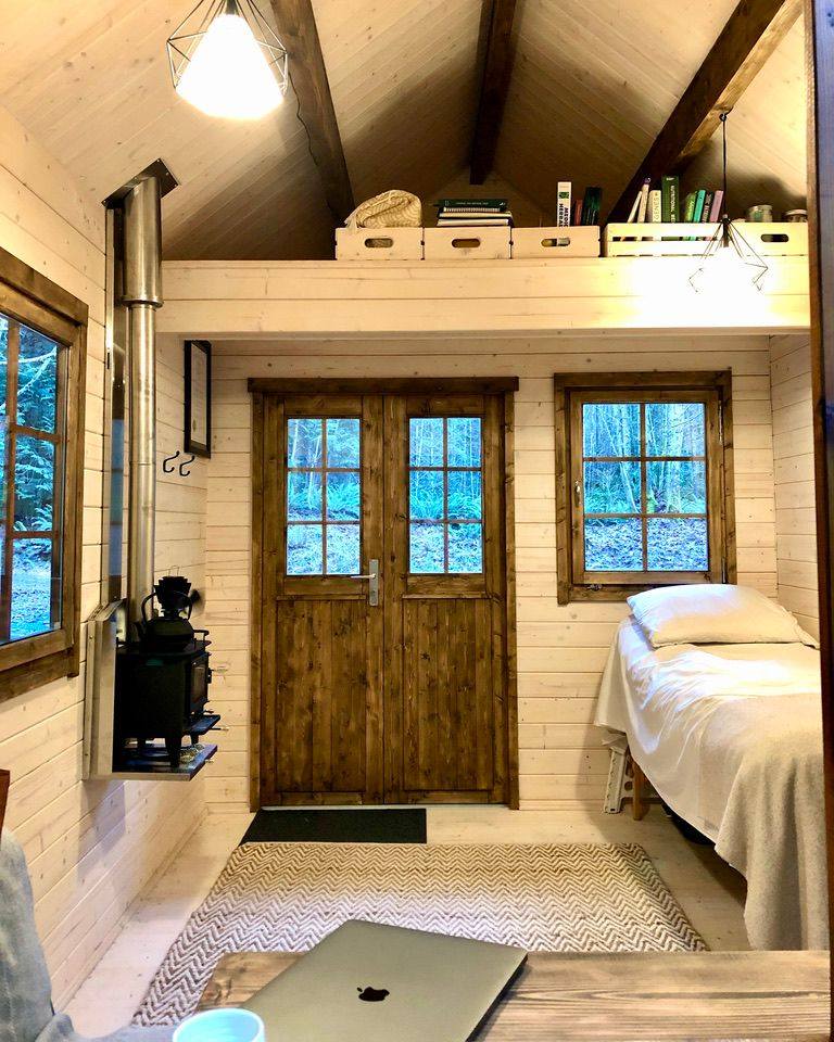Eagle Loft Bunkie interior with upper loft used for storage