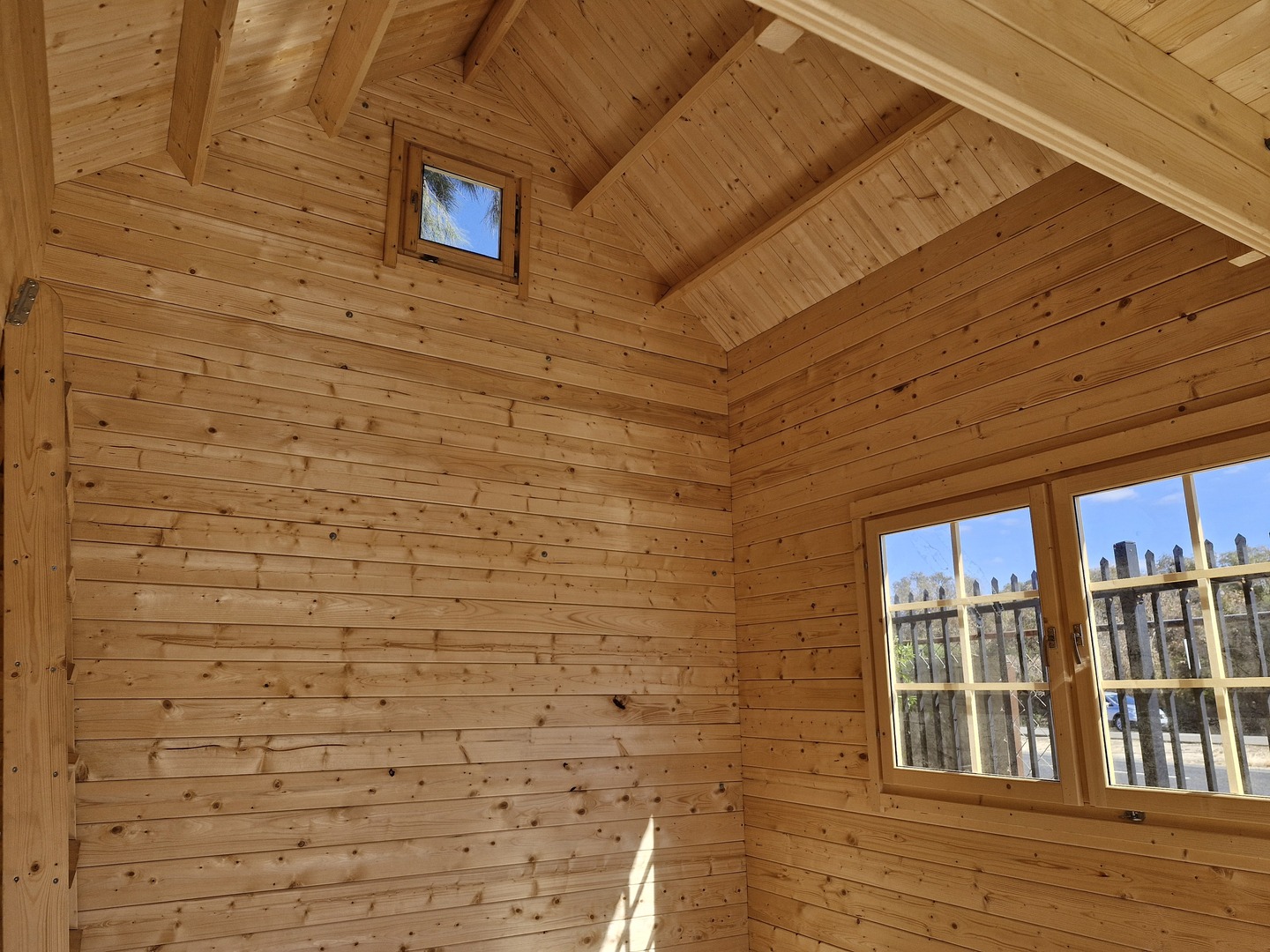Hudson Bunkie interior showing picture window on the back wall
