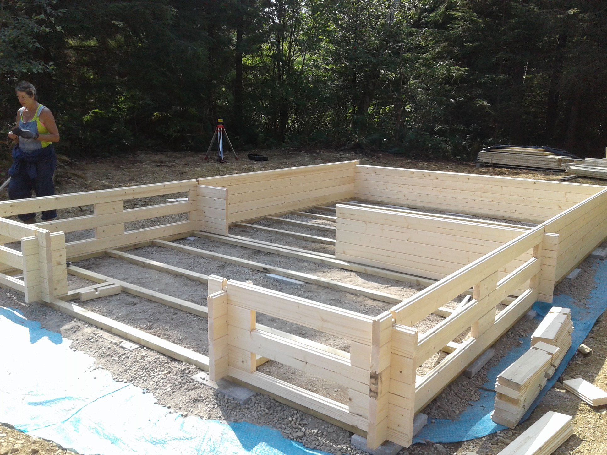 Big Sky Cabin assembly step 2 wall boards being installed