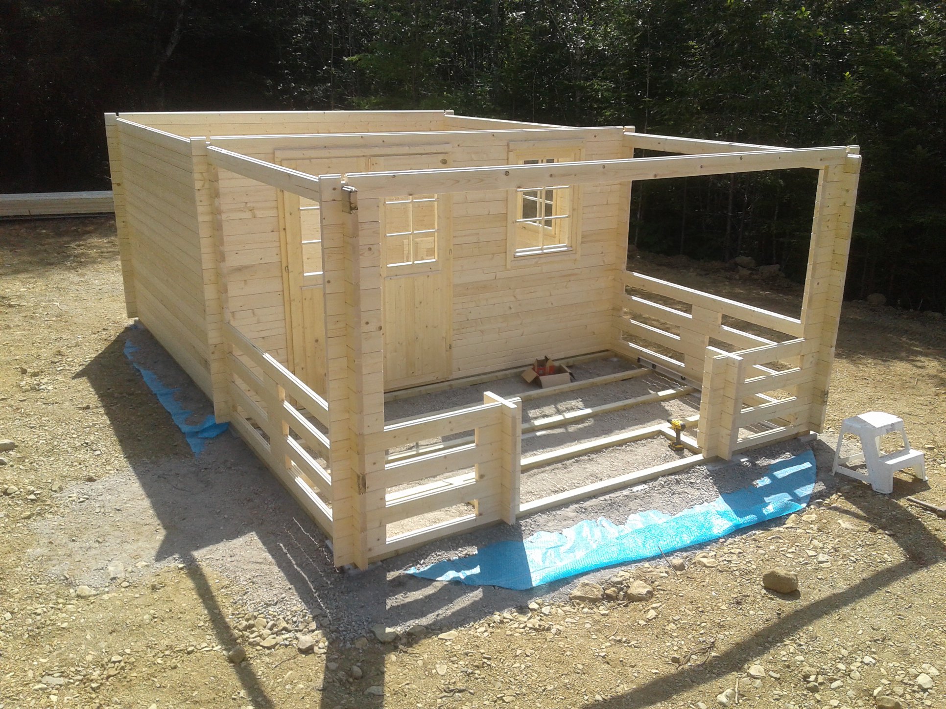 Big Sky Cabin assembly step 4 wall height progressing