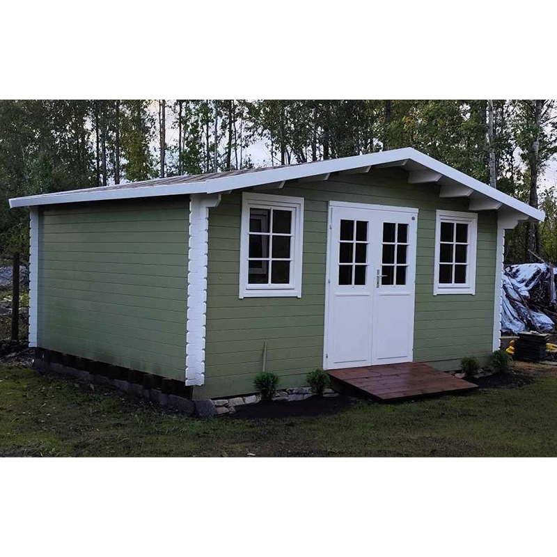Allegheny Studio Shed painted green with white trim
