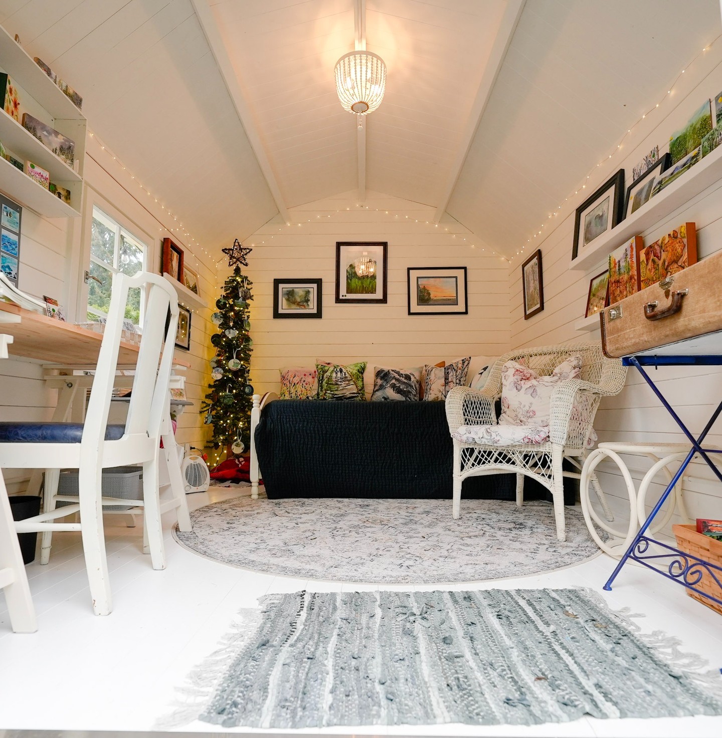 Decorated she shed inside a finished barn shed