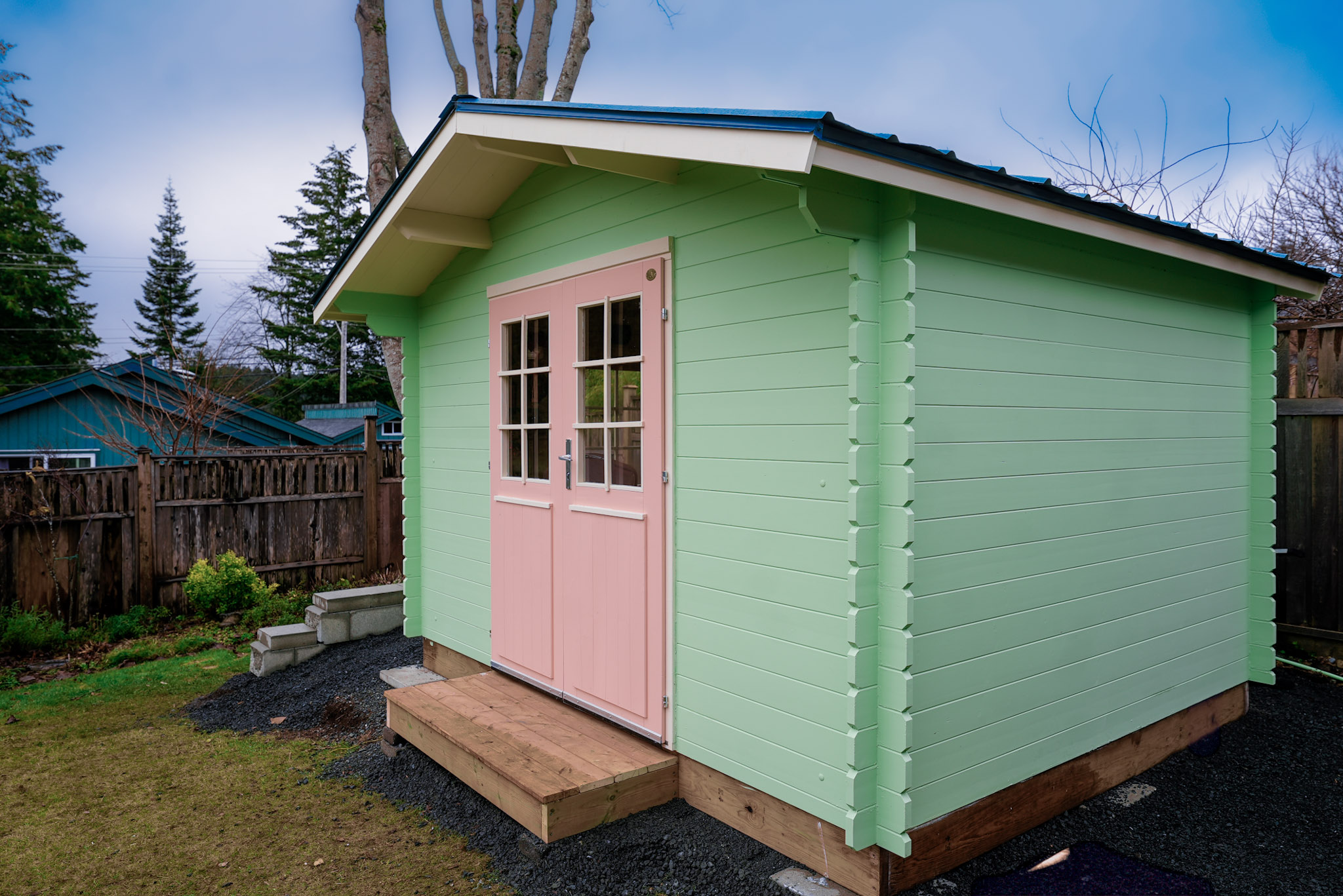 Children's playhouse made from a backyard diy shed structure