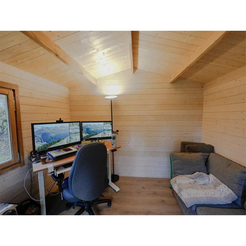 Finished backyard office inside a white painted garden shed
