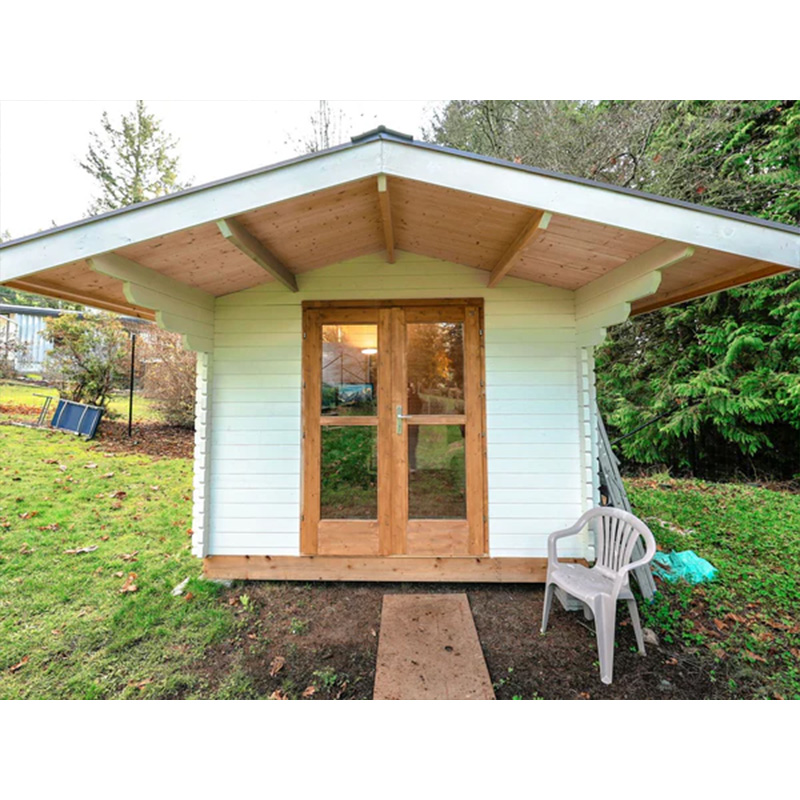 White painted Roosevelt Garden Studio used as a backyard office shed