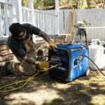 4500 watt inverter generator with heavy-duty outdoor cords nearby