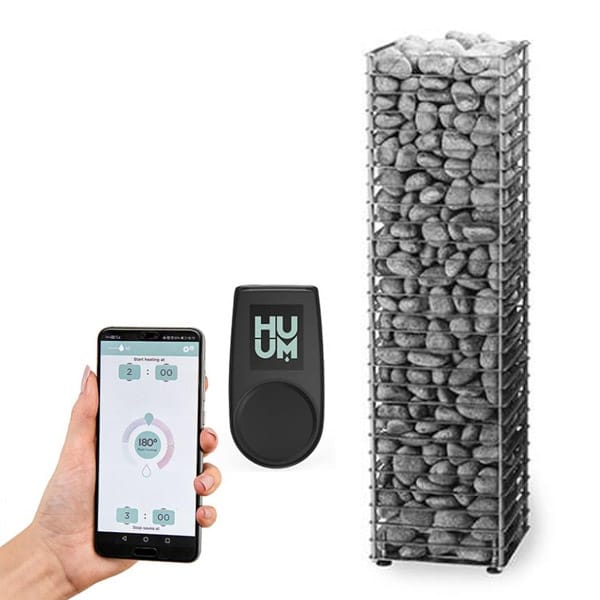 Modern cedar sauna exterior featuring standing seam metal roof and large window