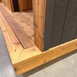 Front view of Silver Star Sauna with cedar deck and custom glass door