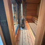 Close-up of cedar bench joinery and smooth finish inside the sauna
