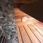 Side view of sauna structure highlighting full insulation and finish