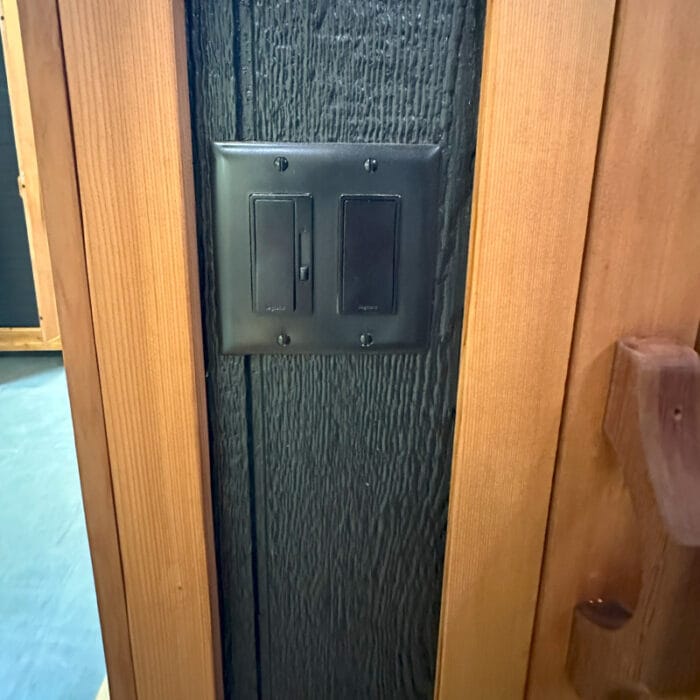 Customers enjoying the sauna as part of a backyard wellness retreat