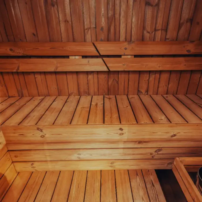cube sauna exterior showing wood grain detail
