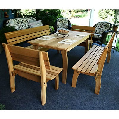 Cedar Chickadee Dining Set in backyard environment, highlighting vibrant sheen and spacious setup as practical cedar furniture for communal zones.