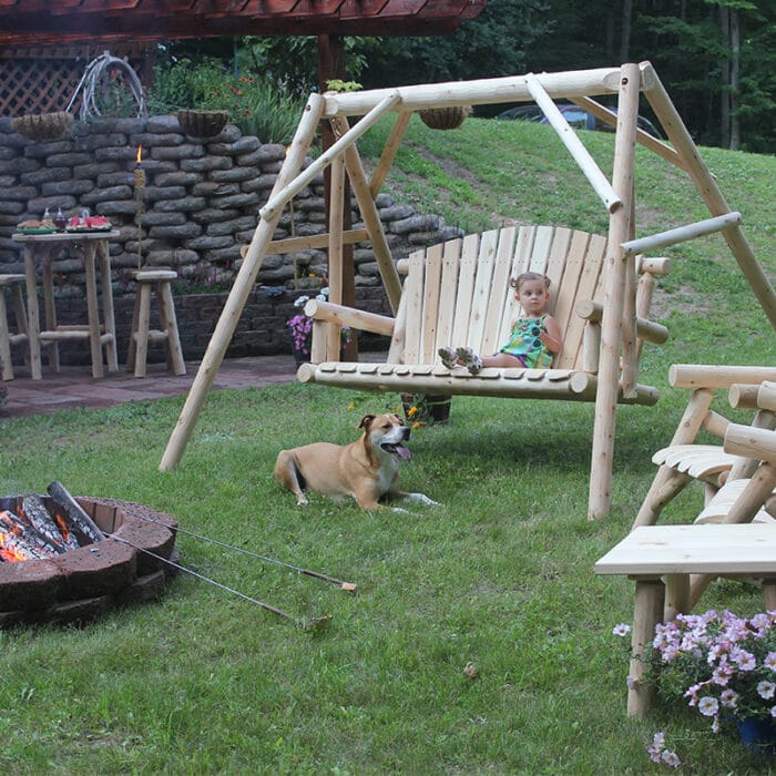 Cedar log swing with natural wood finish