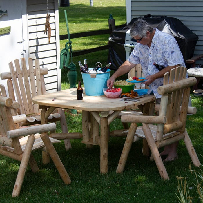 Rustic round wooden table on patio