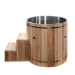 Barrel cold plunge tub with ergonomic built-in seat