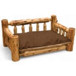 Cabin-style cedar log pet bed with mattress