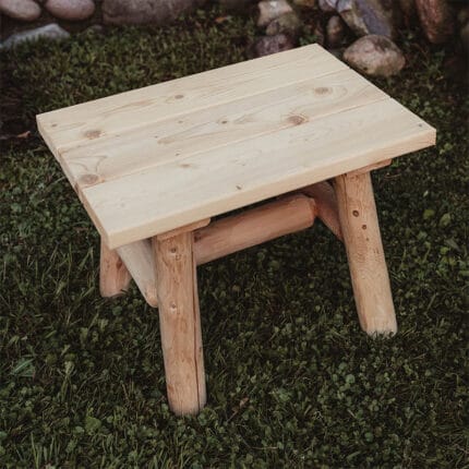 Log end table in outdoor setting