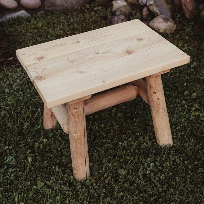 Log end table in outdoor setting