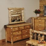 Cedar Log Half-Log Mirror mounted on rustic wall