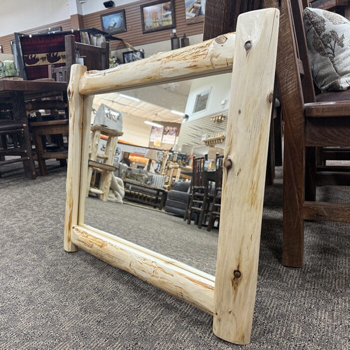 Rustic wood wall mirror with half-log cedar frame