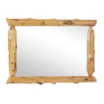 Half-log cedar mirror above dresser in bedroom