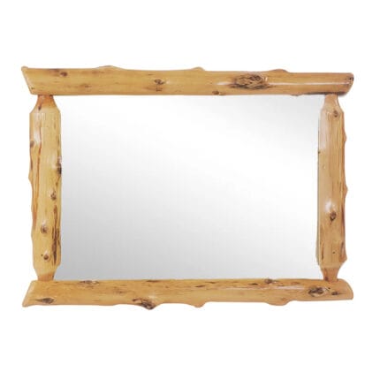 Half-log cedar mirror above dresser in bedroom
