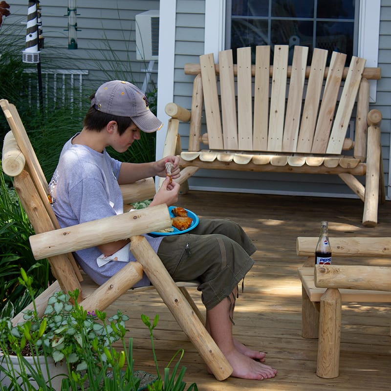 Side view of log wood loveseat