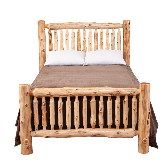 Small Spindle Bed shown in a cabin-style interior