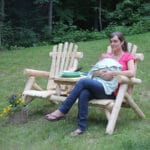 Side view of log tete-a-tete seating