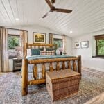 Overhead view of the log bed set in a cozy cabin bedroom