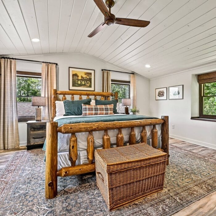 Overhead view of the log bed set in a cozy cabin bedroom