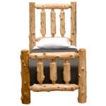 Detail of mortise and tenon joinery in log bed frame