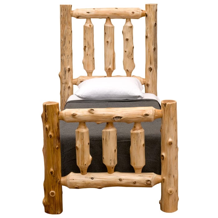 Detail of mortise and tenon joinery in log bed frame