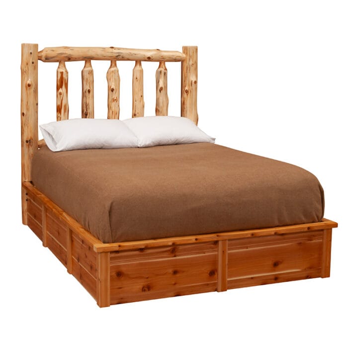 Side view of handcrafted wood platform bed with log frame
