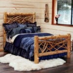 Handcrafted king size Cedar Log Twig Bed in rustic bedroom setting