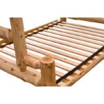 Close-up of staircase steps on cedar log bunk bed