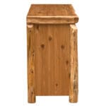 Detailed view of hand-peeled cedar log dresser for bedroom