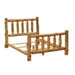 Footboard of log cabin bed with natural cedar knots