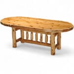 Handcrafted oval rustic table made from cedar logs