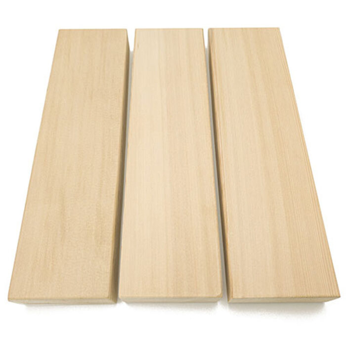 Clear cedar lumber board prepared for sauna bench installation