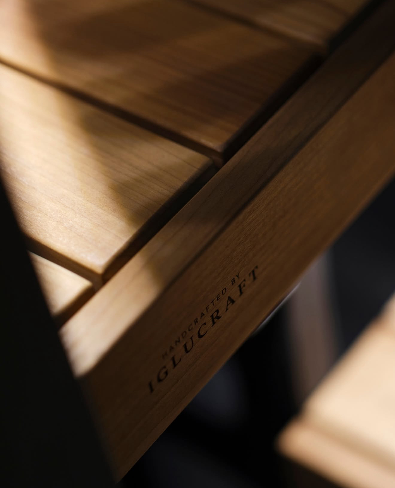 Close-up view of sauna shingle installation and woodwork