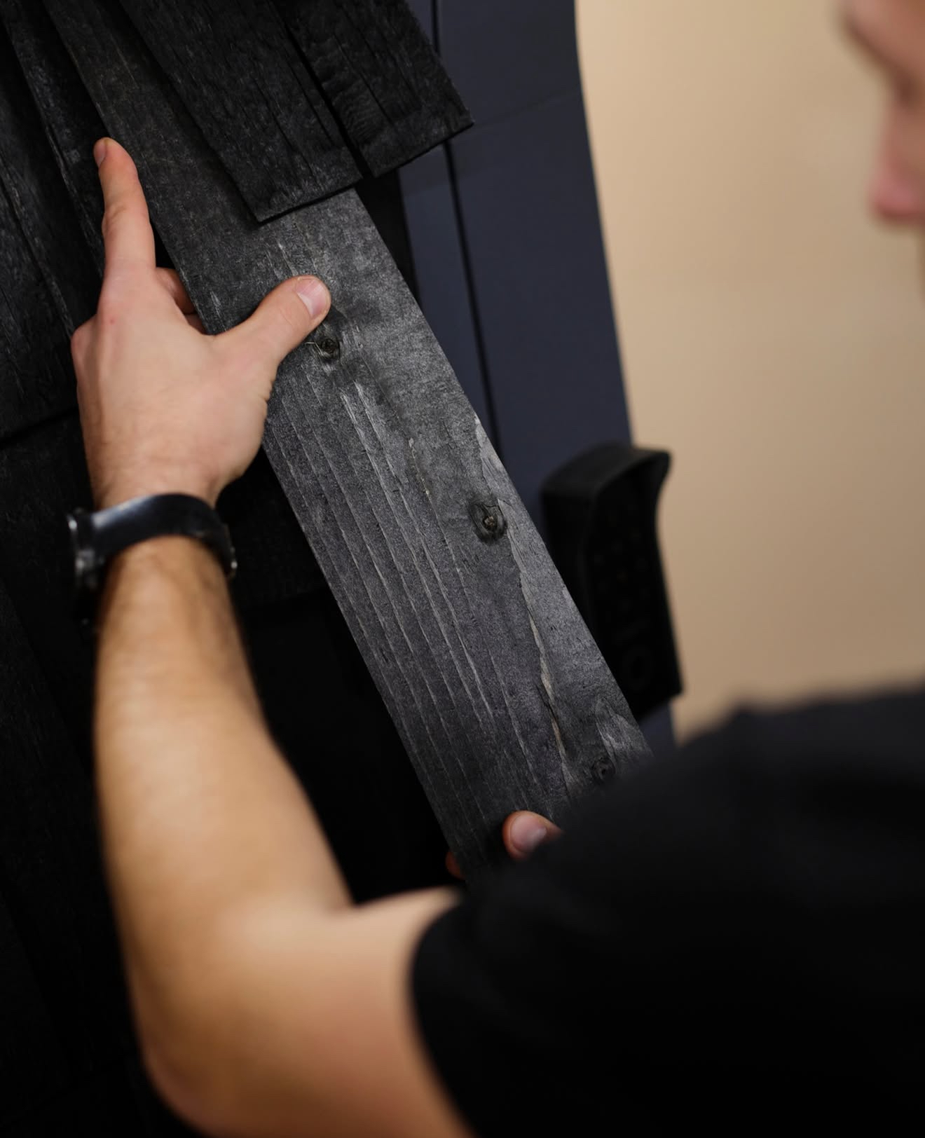 Sauna exterior craftsmanship detail with shingles and trim