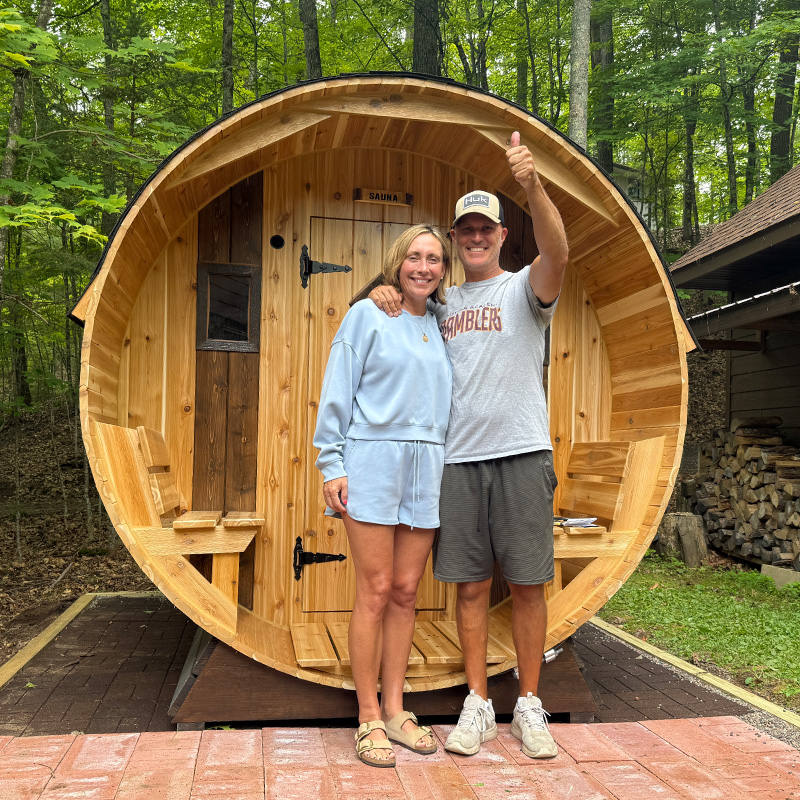 Side view of 7' x 8' barrel sauna curved design and cedar construction
