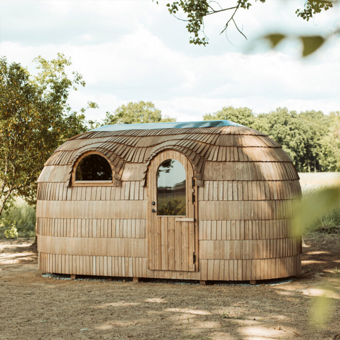 Chestnut exterior finish on a round wood fired sauna