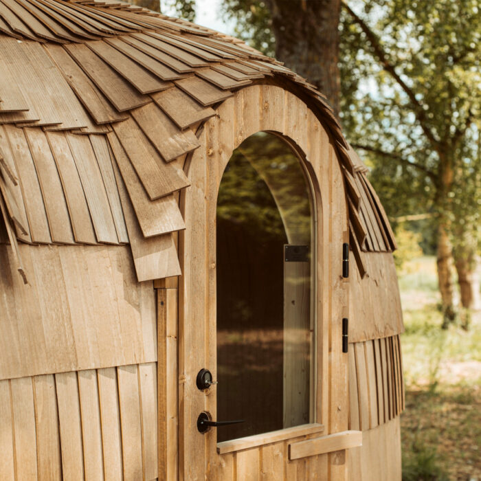 Natural wood interior inside a luxury outdoor sauna