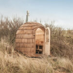 Chestnut exterior finish on a round outdoor sauna