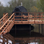 Smokesauna black interior finish inside an outdoor sauna